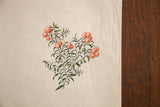 Antique watercolor painting of rose and red yew berries with green leaves on aged paper.