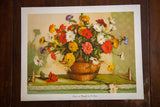 Vintage 1970s Della Roberts still life lithograph of a vibrant Zinnias and Marigolds bouquet.