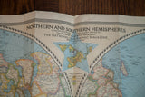 Title block and inset World Terrain map on a vintage National Geographic Hemispheres map.
