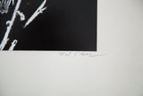 Mark Roberts' pencil signature on white mat of abstract black and white print.