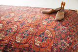 Tekke rug's madder, aubergine, dark blue, ivory geometric patterns, with flatweave kilim edge.