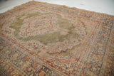 Vintage Turkish Kayseri rug showing unusual green field, intricate motifs, and wear to knot base.