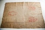 Turkish silk rug with blanched beige field, faded red panel designs, and inscriptions, 4'1