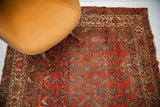 Intricate Herati motif and cranberry rose field with sky blue accents on vintage Hamadan rug.