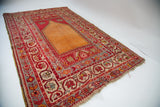 Cranberry red, beige, and grey-blue Ladik-type border patterns with visible fringe wear.