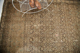 Blanched charcoal Hamadan rug field, featuring repeating herati pattern with light blue birds.
