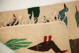 Natural beige flatweave texture and hand-tied cream fringe on a Romanian Pictorial Kilim.
