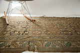 Aged Caucasian runner's geometric pattern, classic serrated border, and frayed bottom edge.