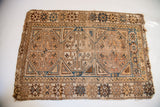 Antique Caucasian rug, neutral ivory, chocolate, medium blue geometric triple medallion design with slight wear.
