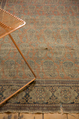 Antique Mohtashem Kashan rug's classic border, original silk selvage, and worn edge.