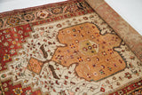 Visible hand-knotted reverse of the vintage Josan Sarouk, displaying sand medallion and ivory field.