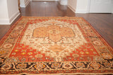 Vintage Josan Sarouk rug, sand medallion on ivory field, rhubarb spandrels, charcoal border.