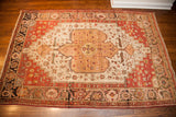 Vintage Josan Sarouk rug corner: dark wool border, rhubarb spandrel, and subtle teal motifs.
