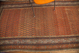 Antique Persian Serbend runner: madder red rust field, allover boteh design, geometric borders.