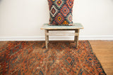 Mid-19th century Turkmen Beshir rug showcasing unique repeating guls in distinct blue and brick red.