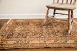 Antique tribal Herati rug, rich walnut chocolate field with rusty red and lime accents.