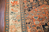 Antique Bijar rug's unique border featuring European roses and distinct Persian geometric field.