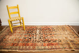 Authentic antique Samarkand runner, distressed, in faded orange, red, and black, 3'3
