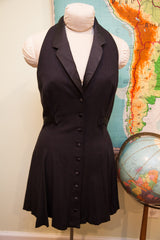 Vintage Betsey Johnson black dress with pointed lapel collar and front buttons.