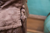 Vintage Asian-inspired dress fabric with subtle leaf pattern and coiled knot buttons.