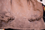 Vintage 60s Asian-inspired dress top featuring subtle leaf pattern and coiled frog closures.