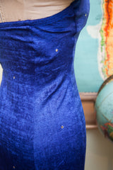 Velvet texture of the blue Betsy Johnson prom dress bodice with small rhinestones.