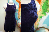 Full view and bust detail of the vintage Betsey Johnson dress in deep purple crushed velvet.