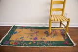 Vintage Art Deco Chinese rug, deep gold field, green border, floral bird motifs. 2x4.