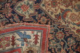 Antique Bijar rug folded, revealing fine wool weave, red weft, and aged end detail.