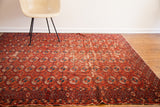 Collector antique Tekke rug corner, displaying red Bokhara guls, geometric border, and aged pile.