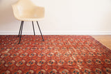 Antique Tekke rug with allover red and dark blue Bokhara guls and subtle patina.