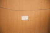 Reverse of framed Yohanan Simon lithograph with gallery label and hanging wire.