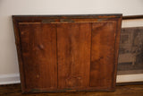 Back of the antique etching's original frame, showing its primitive three-plank wood construction.