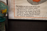 The 1927 copyright and maker's mark on the torn, aged corner of the vintage Squibb poster.