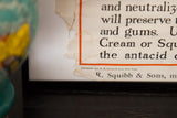 Fragile paper corner of a vintage Squibb ad showing the 1927 copyright mark.
