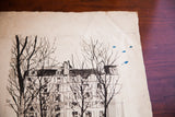 Detail of Irving Nurick Paris etching with bare trees, blue paint drops, and aged paper texture.