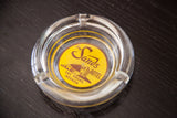 Yellow and brown Sands Hotel Las Vegas logo detail on vintage ashtray.