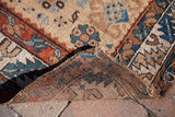 Corner detail of antique Northwest Persian runner, revealing hand-knotted construction and aged pile.