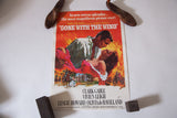 Iconic 1970s Gone With The Wind movie poster showing Scarlett and Rhett.