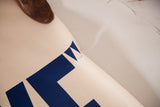 Vintage We Like Ike political poster edge with tear and blue 
