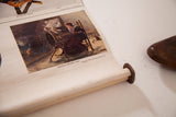 Antique school pull-down chart with Priscilla spinning illustration and wood roller.