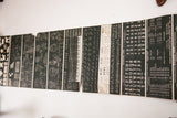 Educational chart sections showing detailed blueprints, botanical art, alphabets, and shorthand lessons.