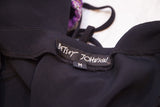 Vintage Betsey Johnson dress black fabric label, showing brand name and size M.