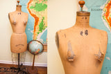 Vintage 1956 Collaps-a-form JR Bauman dress form, size 12, with distressed beige canvas.