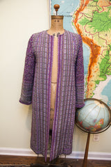 Vintage 60s Andre Laug Elizabeth Arden coat robe with purple floral striped design.
