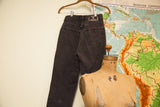 Versace Jeans Couture faded acid wash black high rise pants, back view.