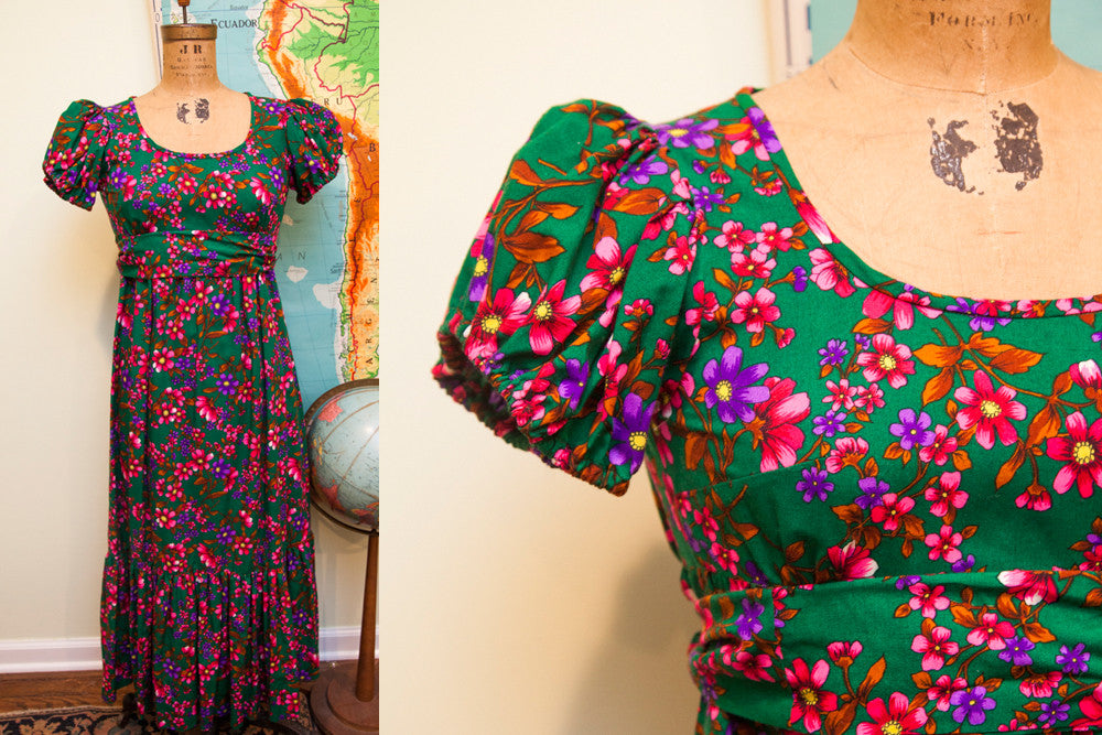 Vintage 70s floral Spring dress, green with vibrant pink, purple, orange flowers, puffy sleeves.