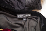 Black Betsey Johnson brand tag and size M label on vintage velvet dress.