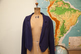 Vintage navy blue slouchy wool sweater jacket, open front on mannequin, displaying wooden button.