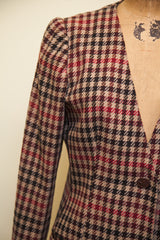Vintage Armani blazer's red, black, and beige houndstooth weave detail.